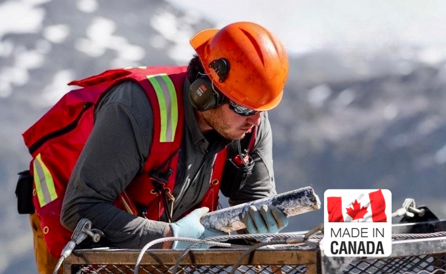 Person in deakin cruiser vest working outdoors with a 'Made in Canada' logo.